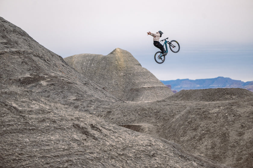 Rider whipping the Santa Cruz Bullit over desert terrain